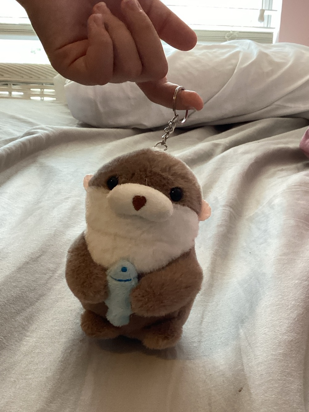 Plush Otter Keychain Toy in Brown and White with Blue Fish